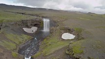 Aerial Waterfall in Iceland mountains
