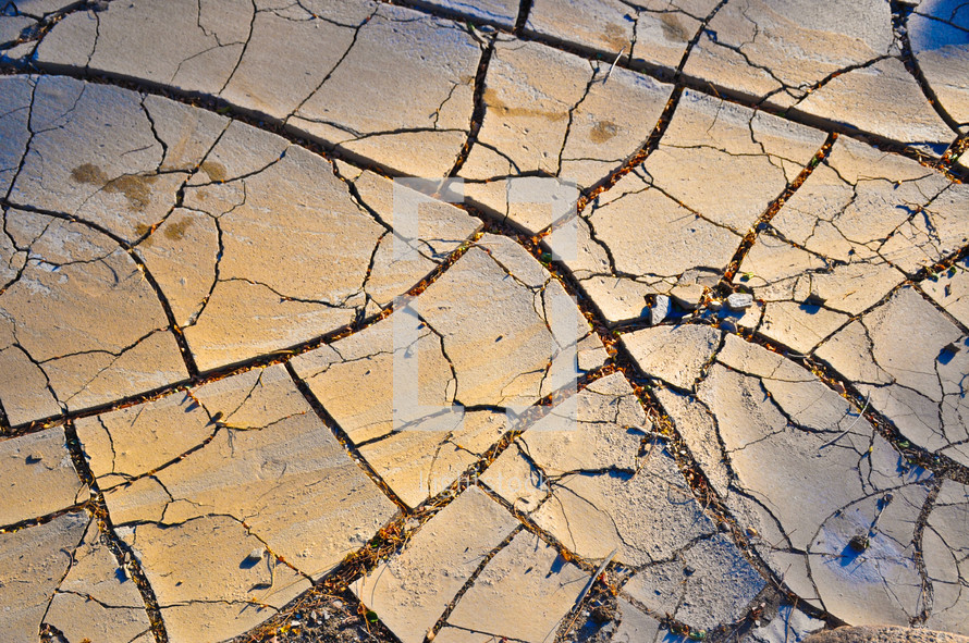 cracked parched clay soil 