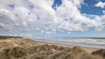 Clouds over ocean beach coast Time-lapse
