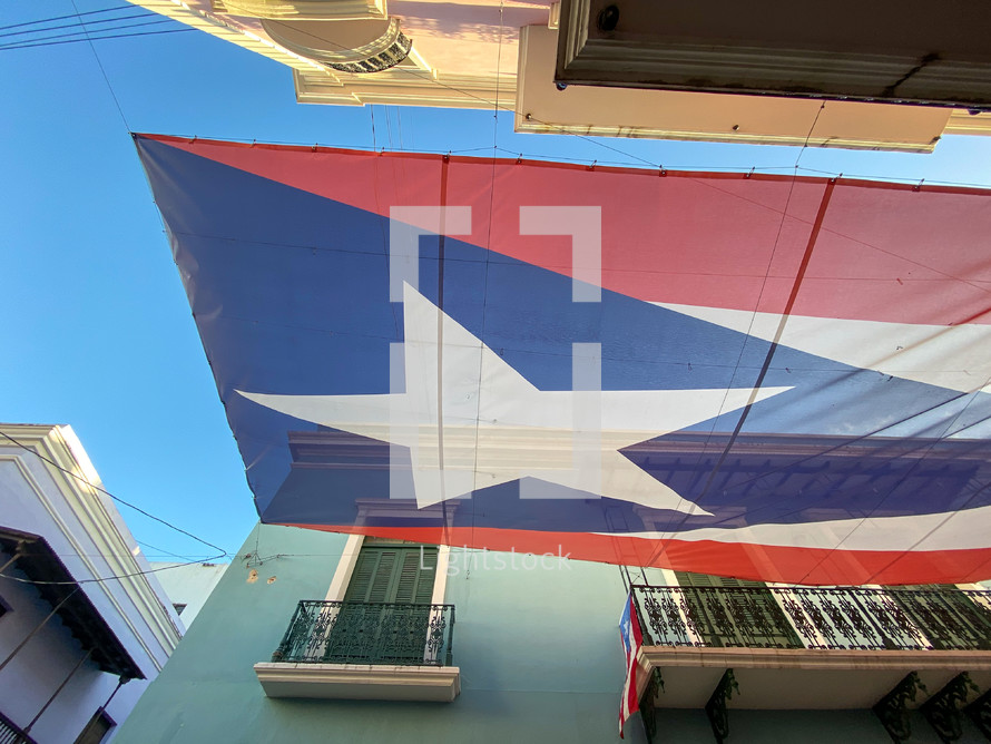Cuban flag banner over the streets in Cuba 