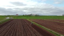 Tractor Cultivating process aerial view