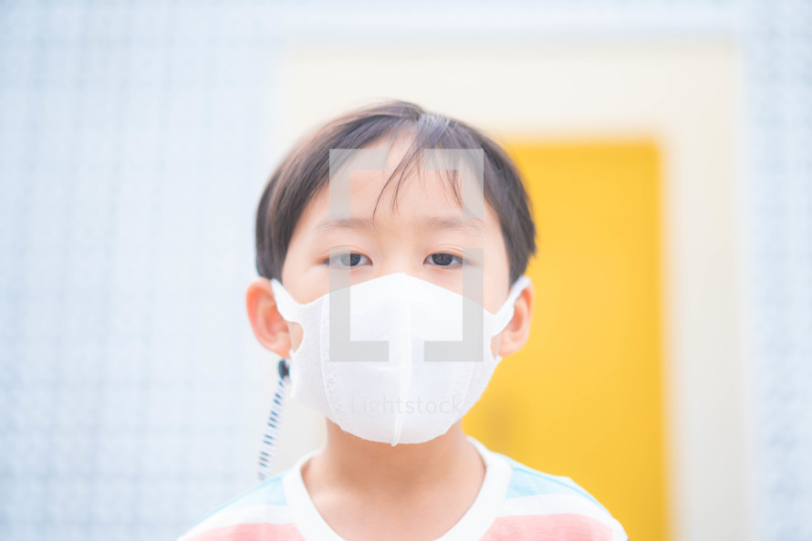 a child wearing a face mask 