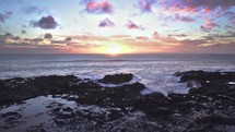 Epic sunset over ocean coast Zoom in
