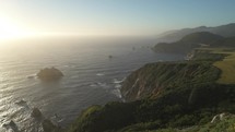 Carmel By The Sea, Big Sur and Bixby Creek Bridge from Distance - a Rugged Stretch of California Central Coast known for Winding Roads, Seaside Cliffs and Coastline