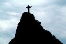 Statue of Jesus on a mountaintop.