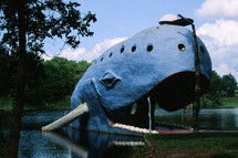 Whale statue in a lake along route 66 