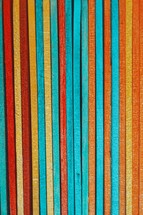 multicolored wooden sticks, colorful background