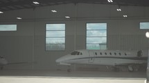 A private jet in a hanger