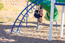 a boy child on a playground 