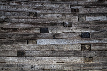 Wall of wooden beams.