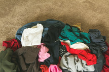 piles of dirty clothes 