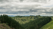 Cloudy day over green mountains nature in New Zealand landscape Time-lapse
