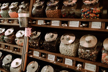 candy in bins at a candy shop 