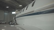 Door and windows of a private jet in a hanger