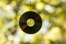 CD hanging on a string