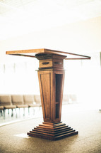 Wooden pulpit in church sanctuary on stage