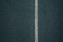 off center line on a road 