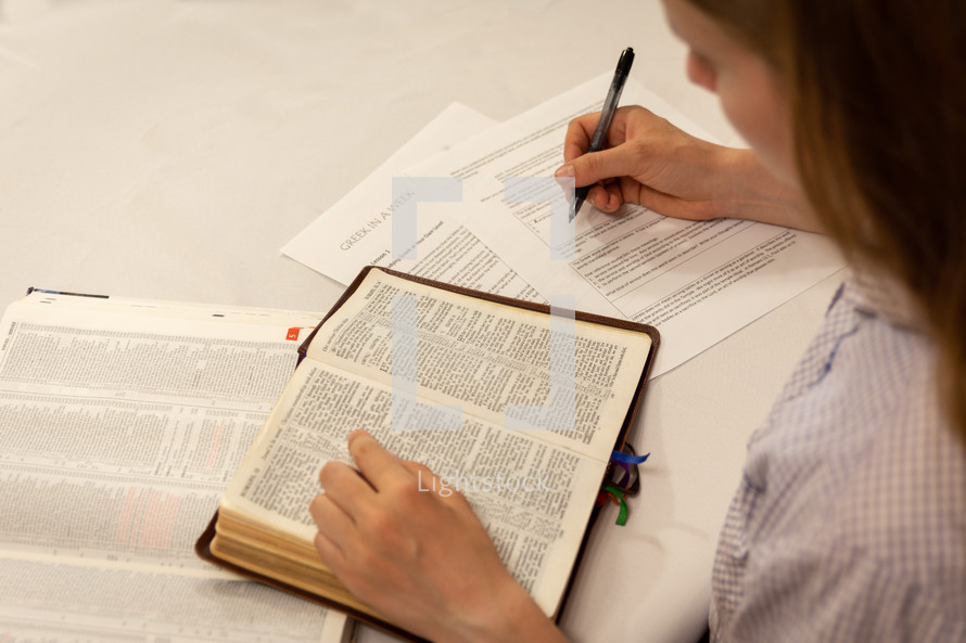 personal Bible study, woman, with Bible taking notes 