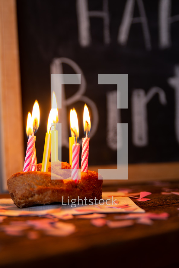 birthday candles in a donut 