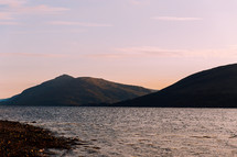 lake shore in Scotland at sunset 