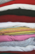 Stack of folded girls clothing