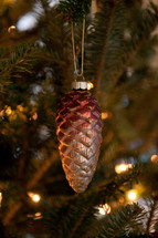 A pinecone Christmas ornament. 