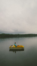woman in a paddle boat 