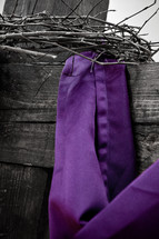 purple cloth on cross 