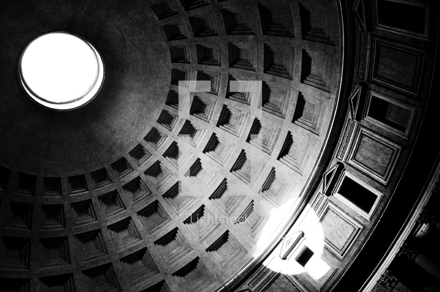 The sun shining through the oculus of the Pantheon dome.