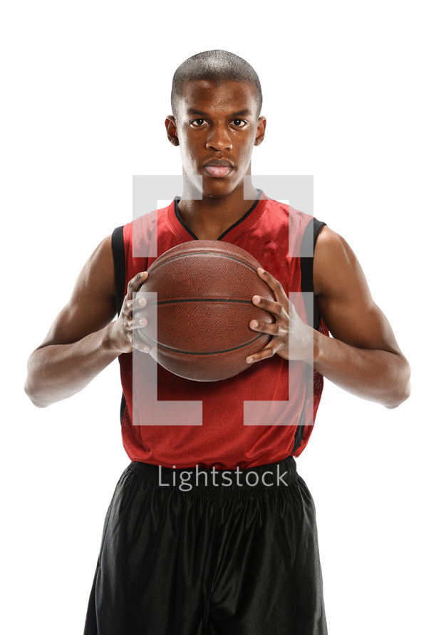 man holding a basketball 