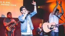 worship leaders leading a congregation in song 