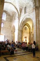 Worshippers in the Church of St Anne.