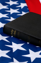 Bible on an American flag 