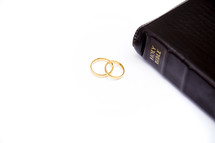 wedding rings and Holy Bible 