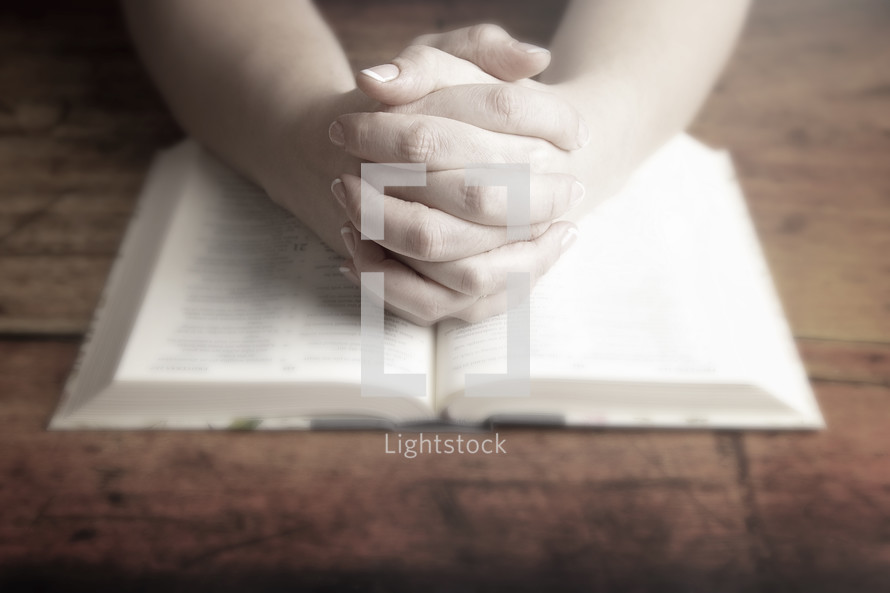  Woman Studying Her Bible at a Rustic Wood Table