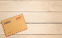 envelope on wood boards 