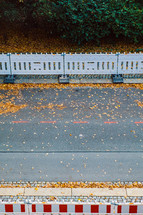 barrier fences on an autumn street 