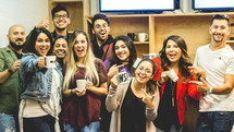 young adult group with coffee mugs 