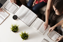 open Bibles on a table at a Bible study 