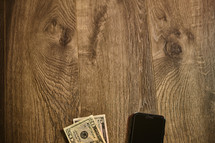 Cell phone next to money