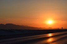 heading towards a fresh start - orange sky during a summer sunrise over a Nevada freeway 