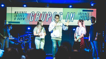 young adults speaking during a worship service 