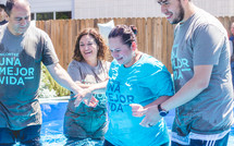 a woman being baptized 
