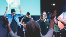 worship leaders leading a congregation in song 