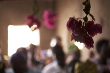 hanging flowers at a worship service 