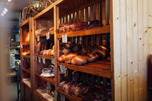 bread on shelves in a bakery 