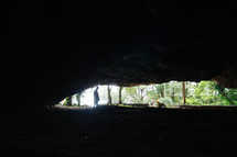 sunlight at the mouth of a cave 