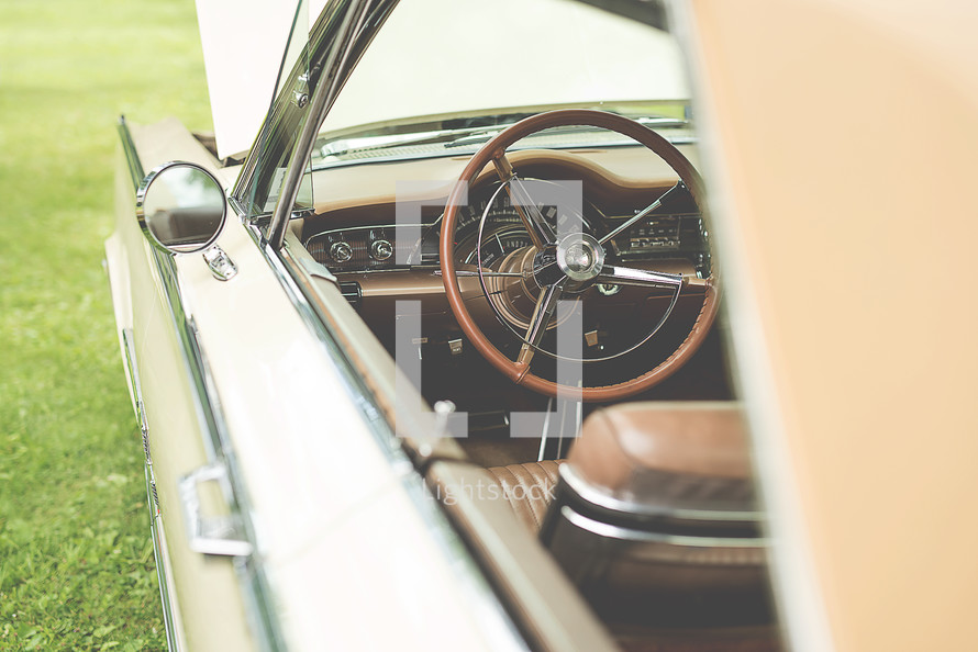 steering wheel of a vintage car 