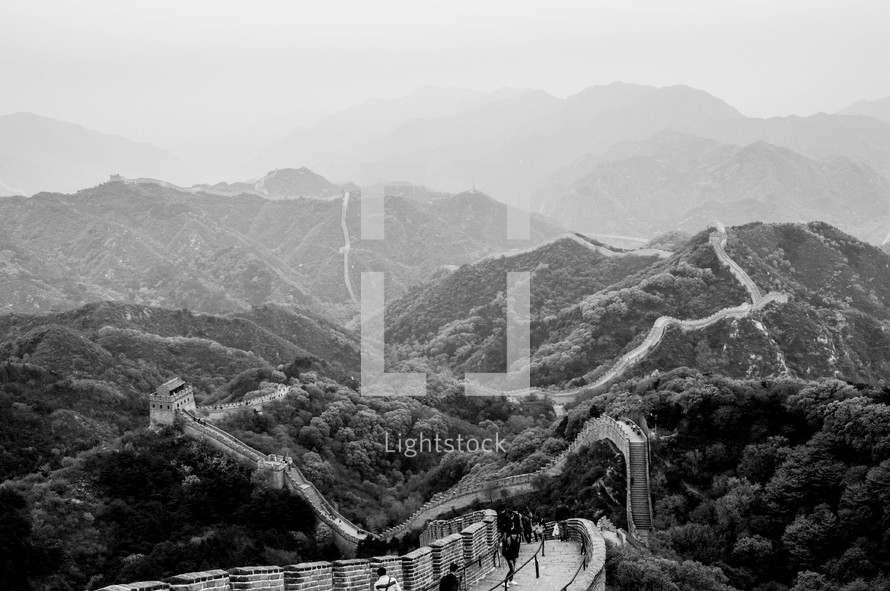 Great Wall of China winding through mountains.