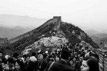 A crowd of people at the Great Wall of China.